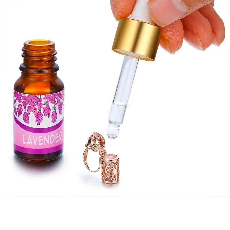 Hollow Out Filigree Cross Perfume Bottle Earrings – Gold Essential Oil Diffuser Jewelry for Women & Girls - Image 6